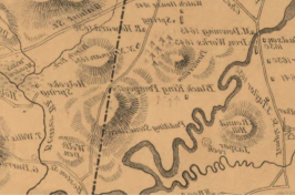 图片显示浅棕色背景和灰色地图文本，上面标有黑色国王庞贝